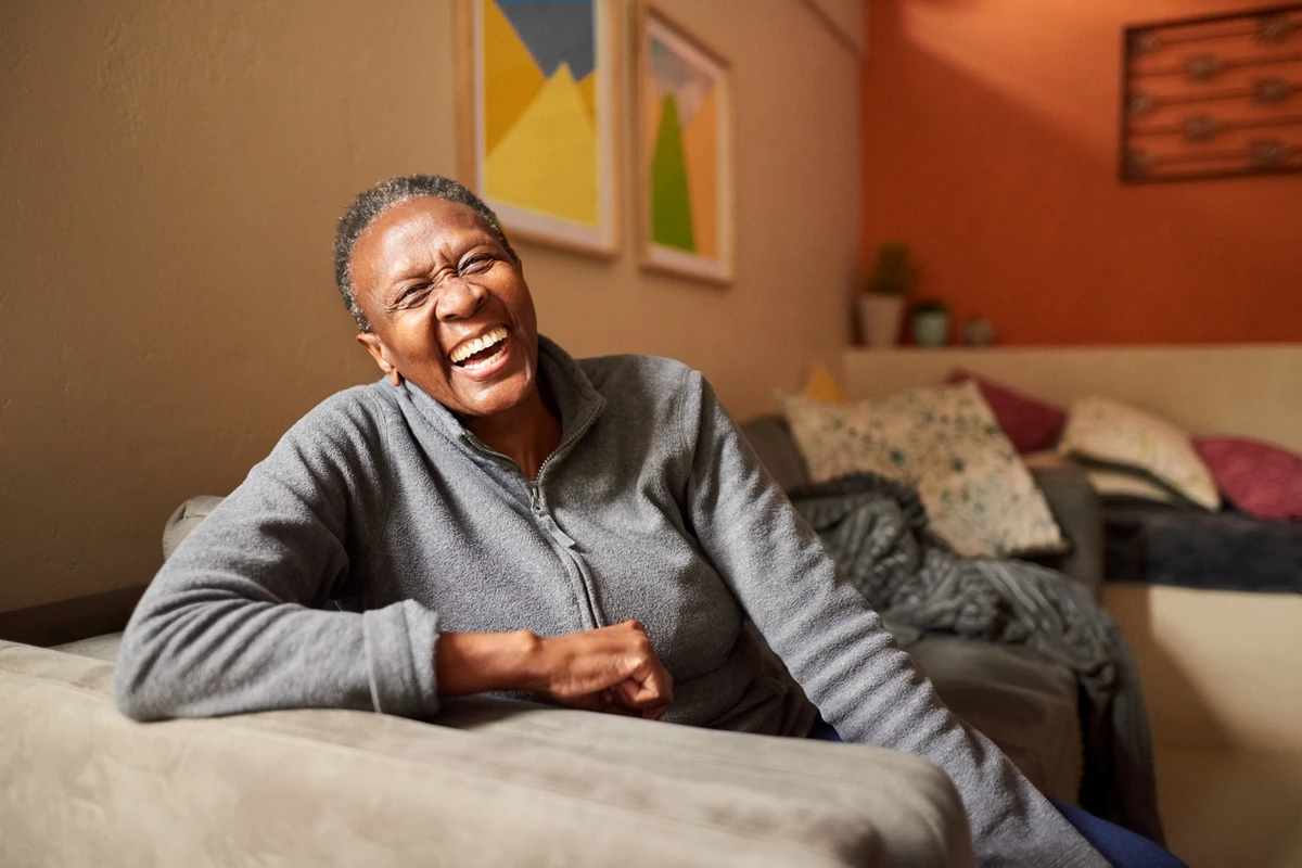 Woman laughing joyfully